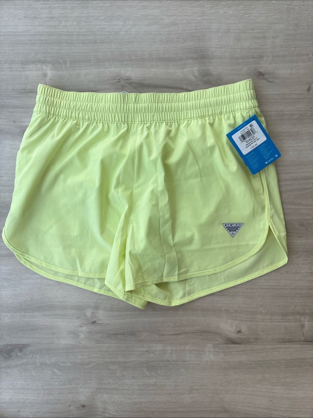 NEW Women’s Columbia Court shorts Performance Neon Yellow Omni Shade UPF 50